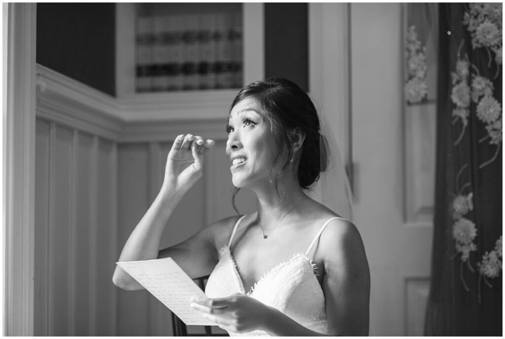 Bride shedding a tear while reading a letter from her future husband.  Photo taken by Dripping Springs TX based Lydia Teague Photography. 