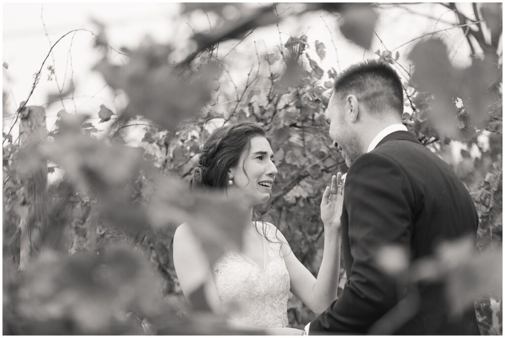 Emotional Bride during a First Look with her future husband in a Vineyard. Photo taken by Dripping Springs TX based Lydia Teague Photography. 