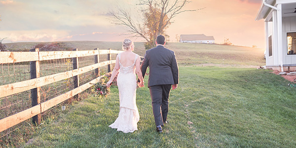 Bride and Groom walk off into the sunset