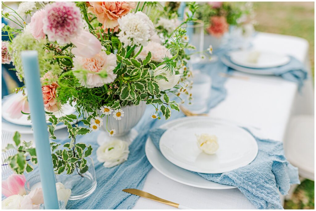 Adding the color blue into the wedding decor through candlesticks and linens create a beautiful soothing effect. Photo taken by Dripping Springs TX based Lydia Teague Photography. 